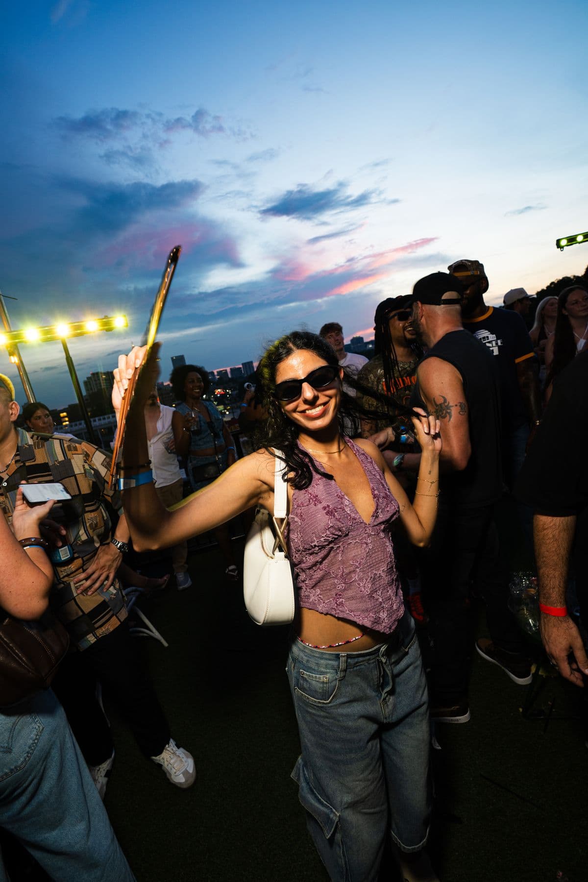 A dancer with a fan at blue hour